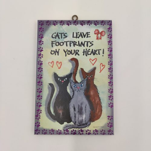 "CATS LEAVE FOOTPRINTS ON YOUR HEART."